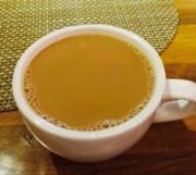 Aromatic tea with silky milk
