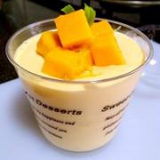 Cup of mango mousse

